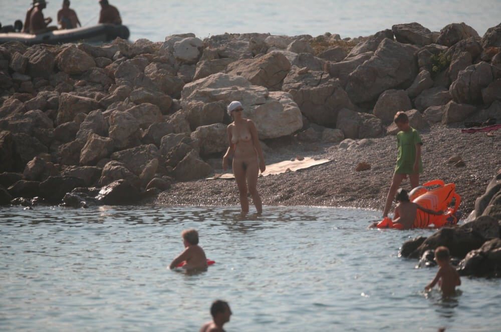 FKK cove pyramid in waters - Nudity is perceived as a natural aspect of life