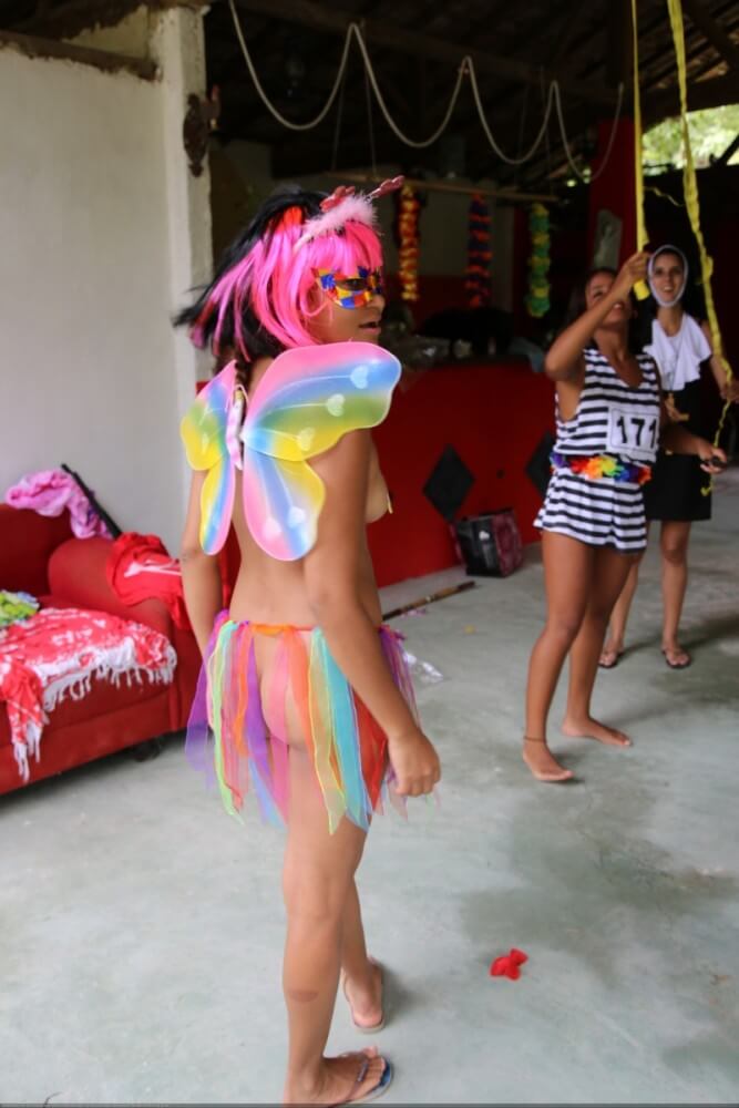 Tropical carnival photo gallery - Nudity helps one appreciate the present moment