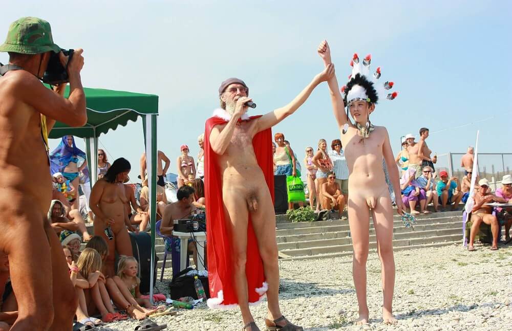 Native Headdress Dance pics - A closed community of naturists