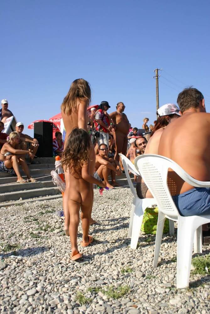 Naturist Standing Sideline - Family nudism in its cultural context