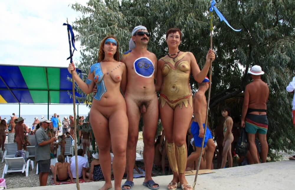 Three Painted Girl Poses pics - Striving for harmony and peace of mind is the essence of naturism
