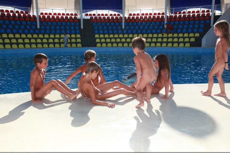 Swimming dolphins photo gallery - People who practice naturism value naturalness and simplicity