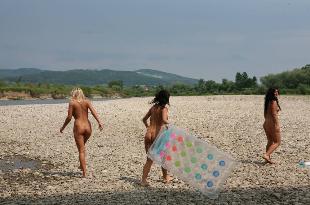 Naturist Park Floating On River photos - Nudity in nudism is a form of honesty with oneself