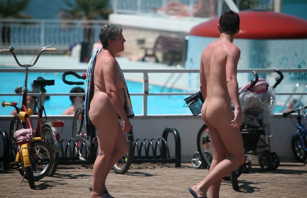 Sun-Soaked Sidewalk pics - Nudity as a natural part of human existence