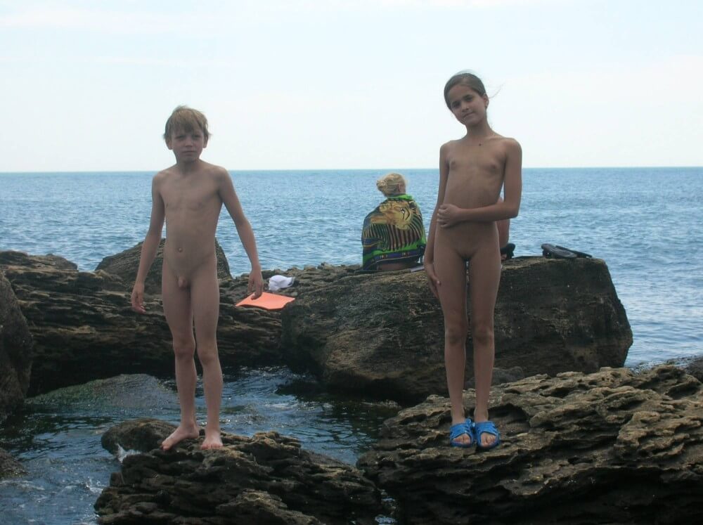Beach Rocking Profile pics - Clothing is a barrier for a nudist
