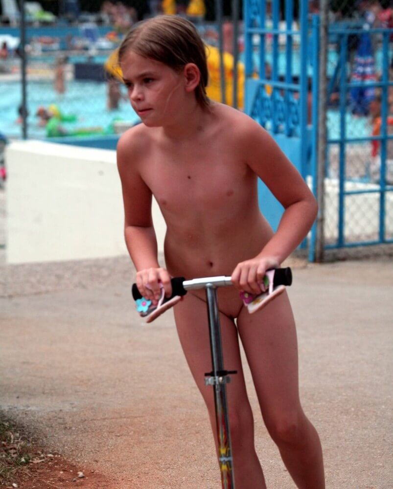 Pool-Side Naturist Scooter pics - For naturists, nudity is part of natural existence