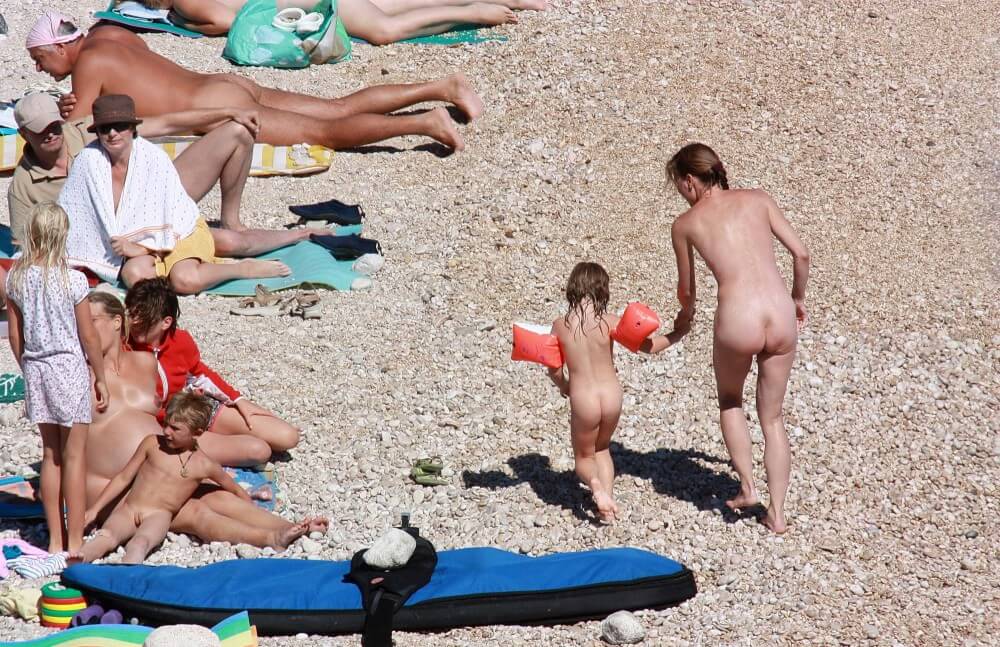 Orange Floaty Safety First Naturist pics - Health is strengthened through naturism
