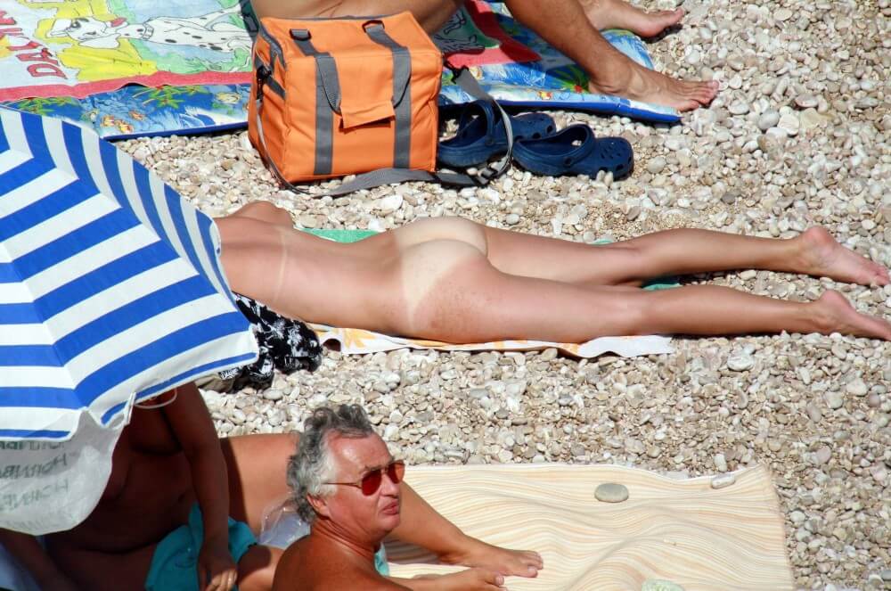 Naturists Beach Relaxation pics - A nudist promotes tolerance and respect for others
