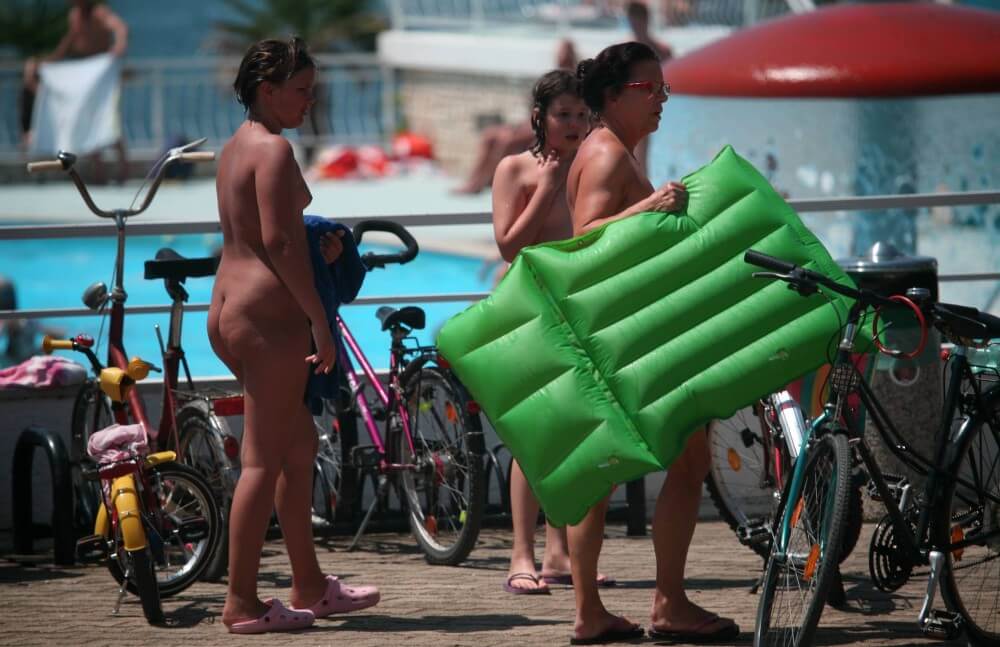 Outdoor Pool Sideliners pics - Naturism and Nudism as a Path to Inner Freedom and Harmony