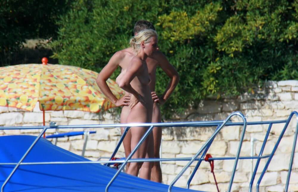 Casual Beachside Strolling pics - People seek unity with nature through naturist practices
