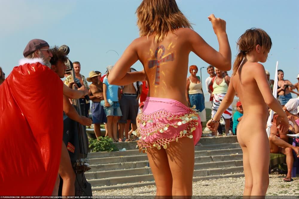 Colorful Carnival Dancing photos - Nudism reduces self-consciousness